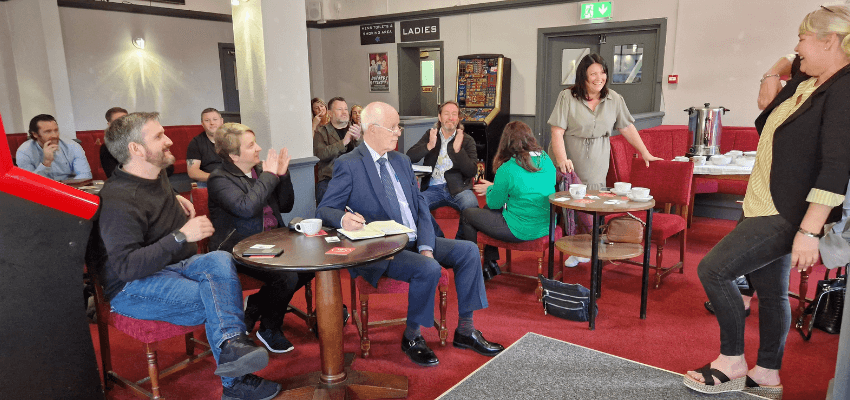 a group of people taking part in a networking event